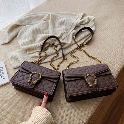 Inclined shoulder bag