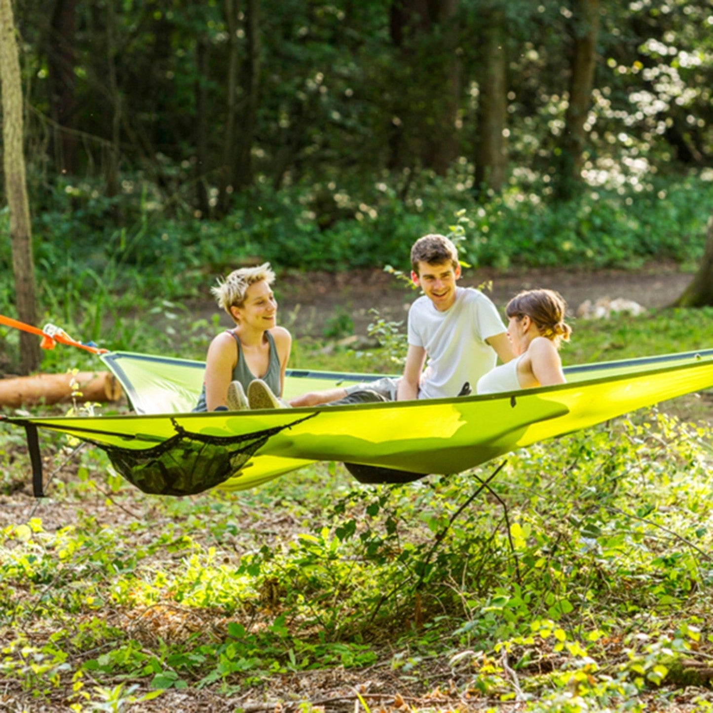 Multi-Person Hammock Three Point Design Portable Hammock Multi-functional Triangle Aerial Mat in use by three friends outdoors.