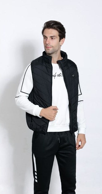 USB interface smart heating vest for men and women shown worn by a model in sporty outfit.